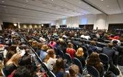 A group of students gathered in a room.